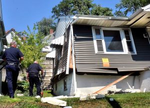 Two found dead in condemned house fire